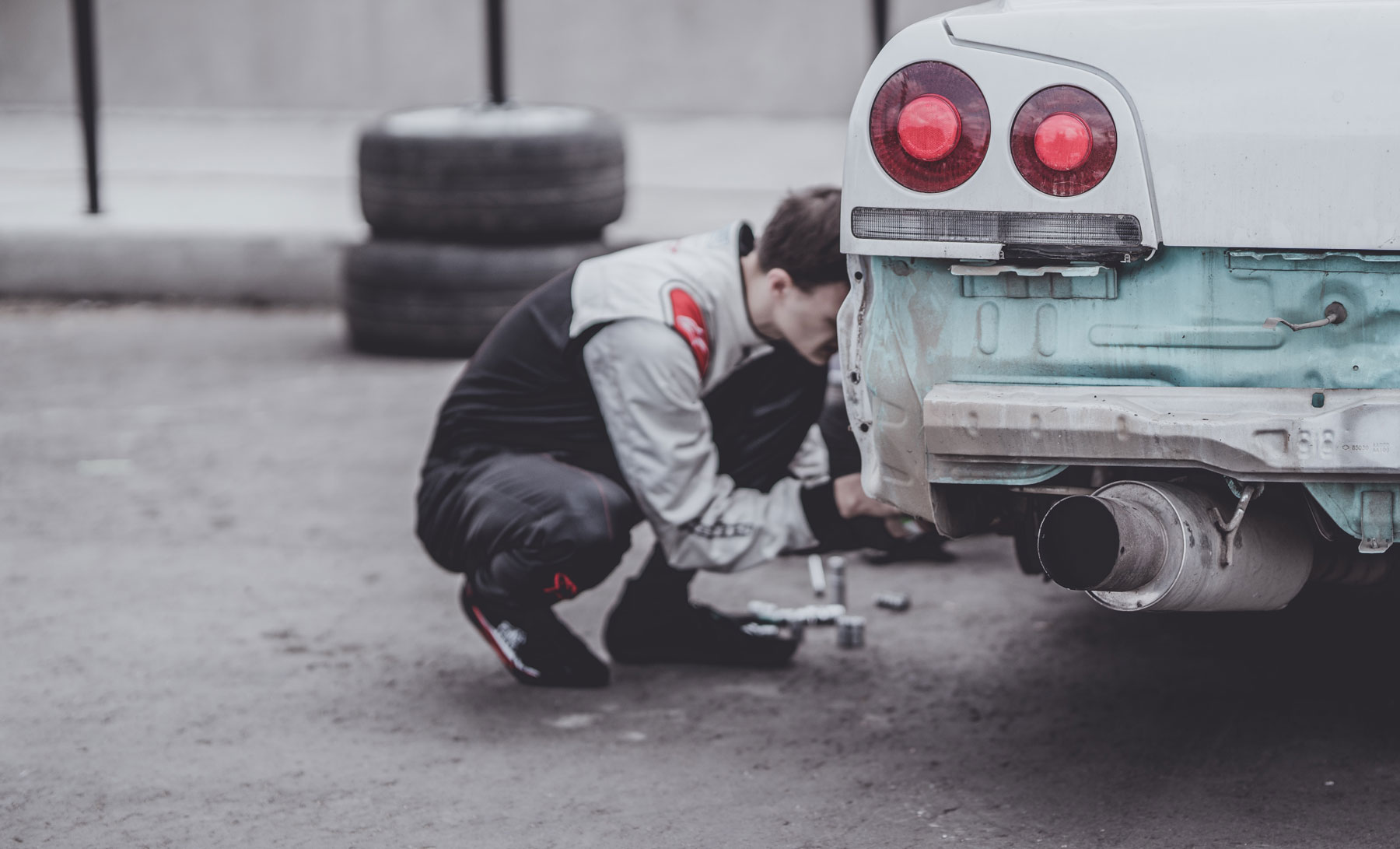 technician working on a corvette tire