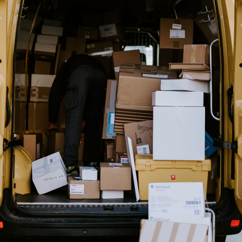 back of a delivery van, full of packages