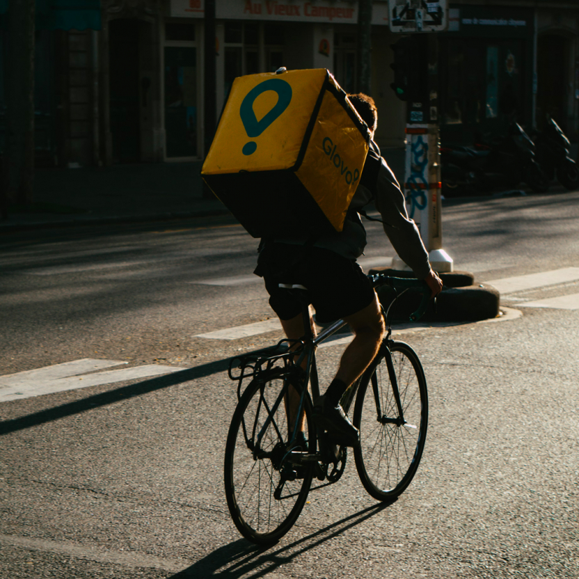 delivery courier on a bike