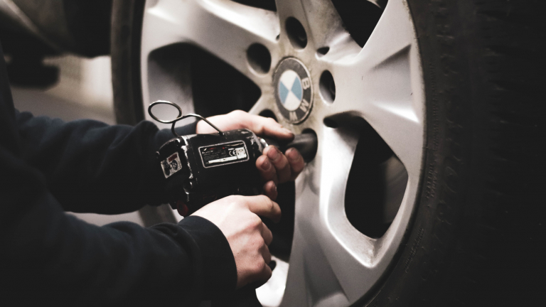 Mechanic changing a car tire