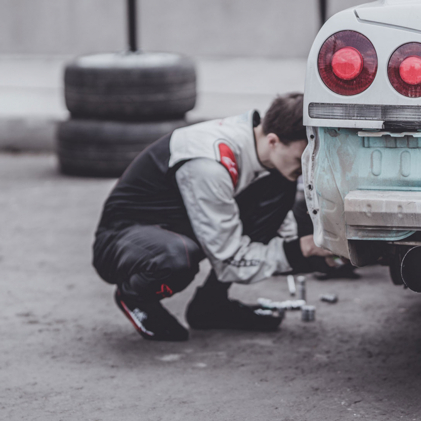 mechanic working on a tire