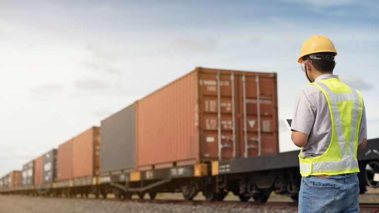 man scanning container numbers with a mobile device