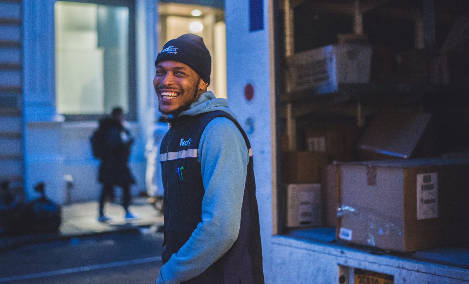 man at the back of a delivery truck