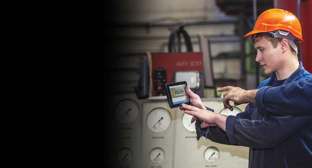 Workers reading meters with a mobile scanner