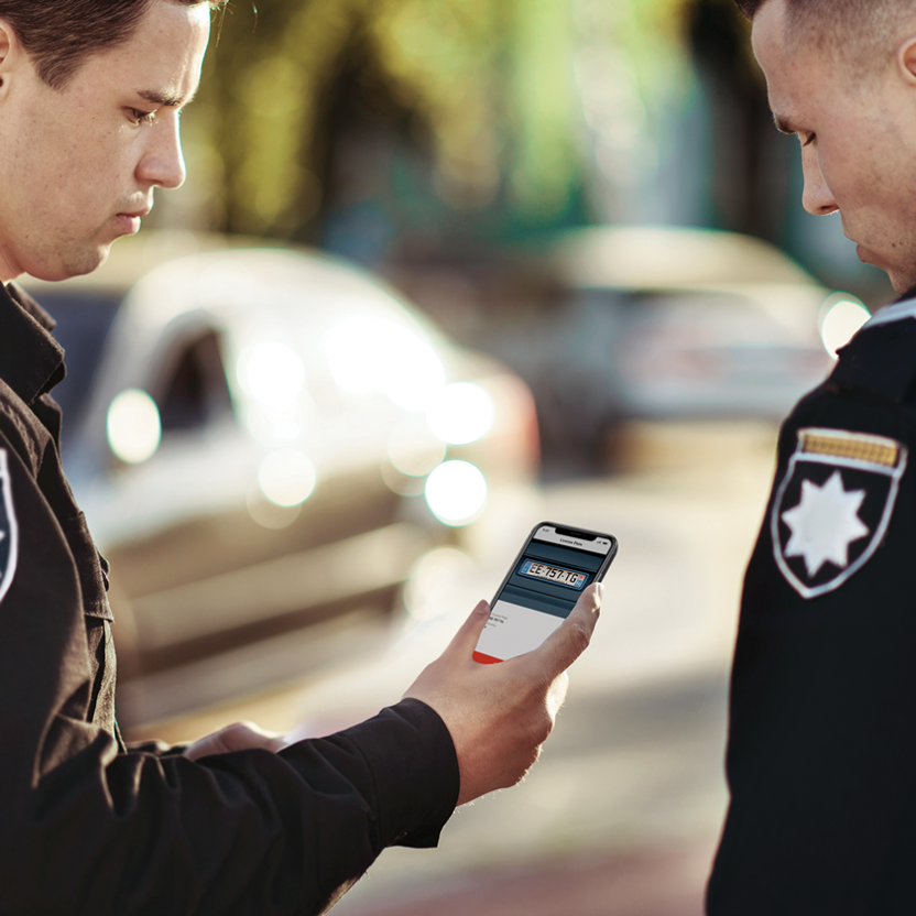 Police officer plate scanning