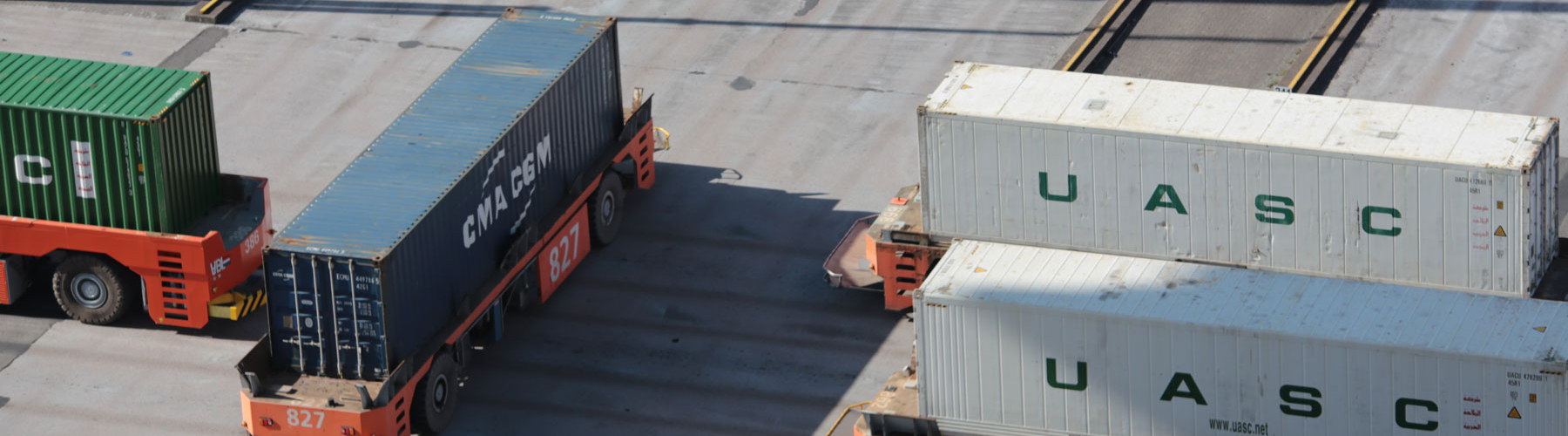 containers sitting on truck trailers