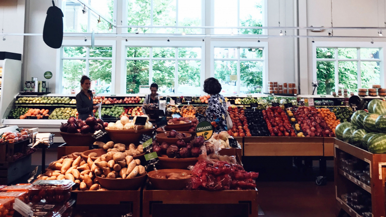 people in a fresh product store