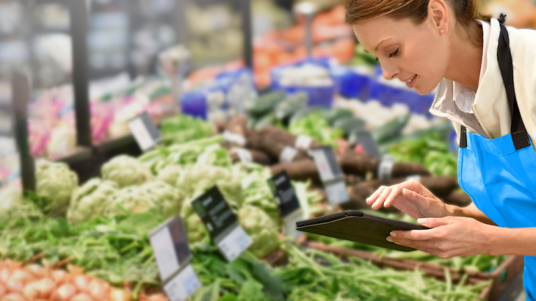 woman checking inventory with an ipad