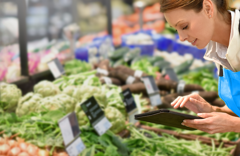 woman checking inventory with an ipad