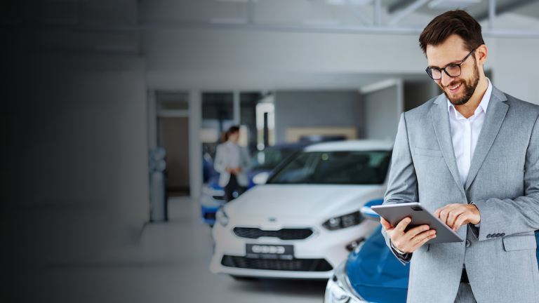 sales man in a car dealership