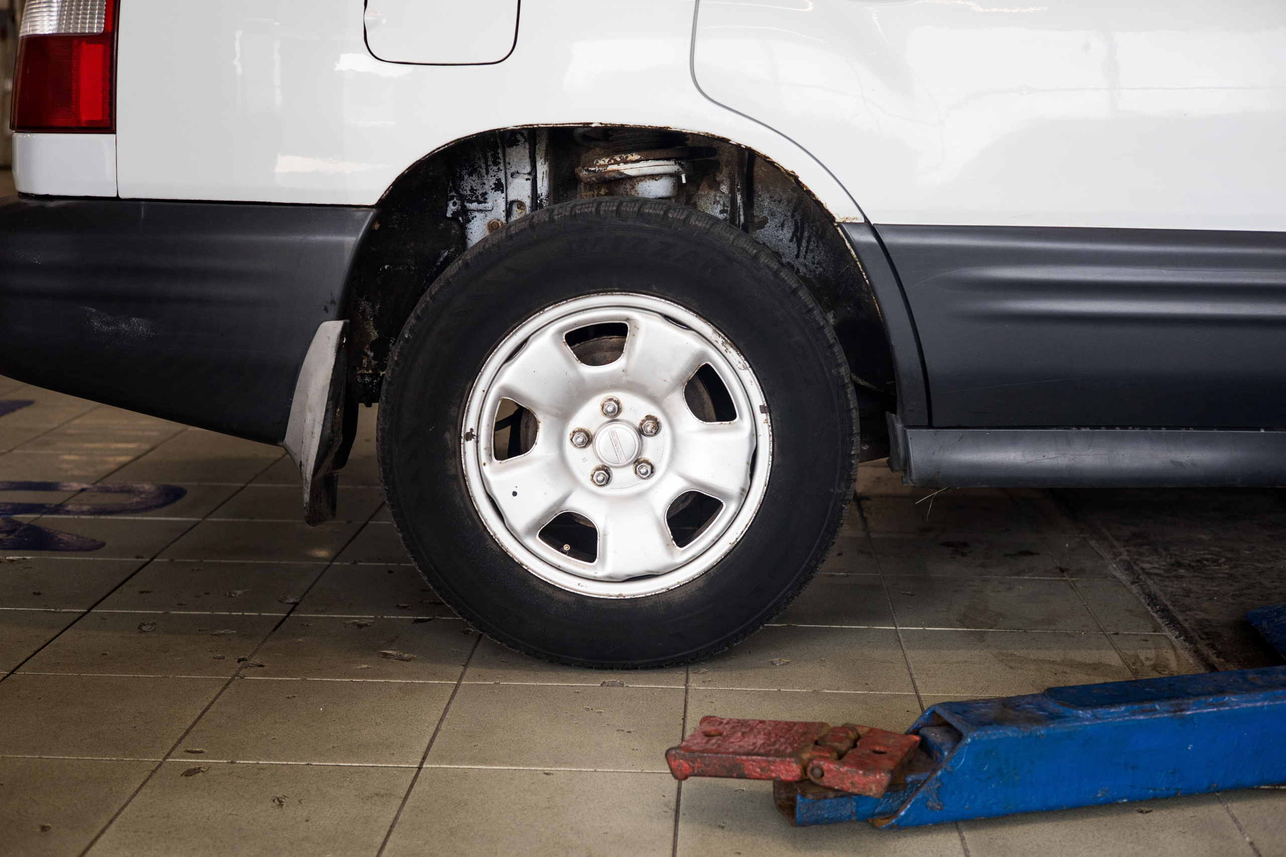 tire on white car