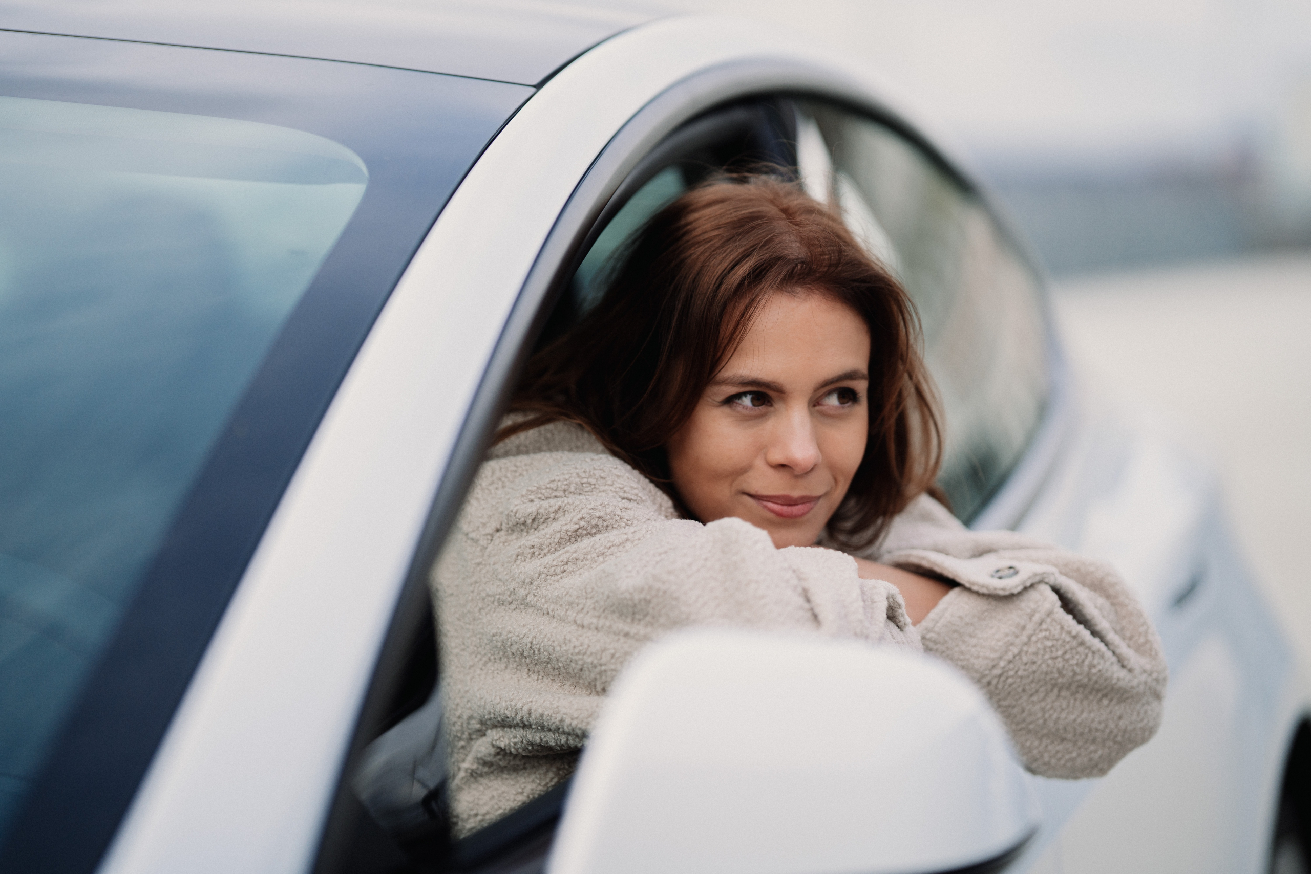 woman looking out of the car window