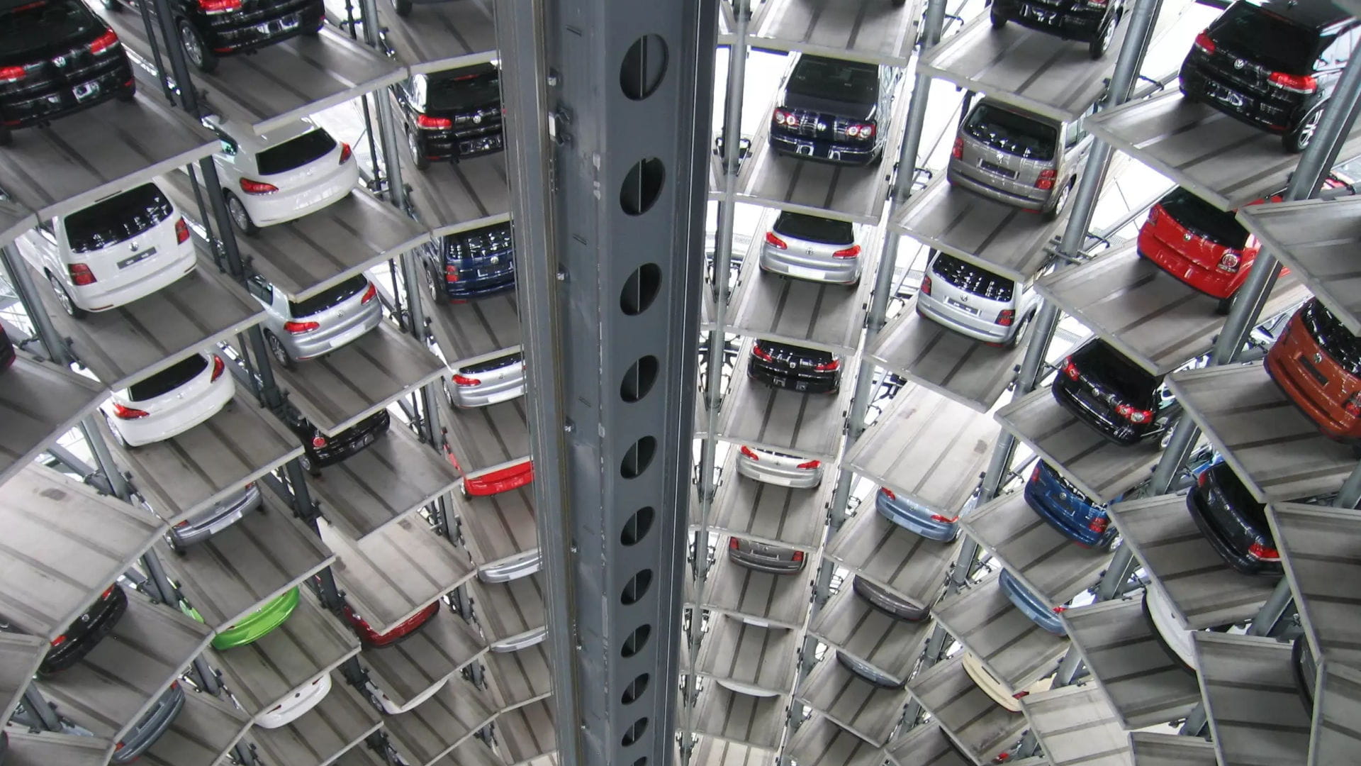 Cars parked in a multi level garage with modern technology and solution