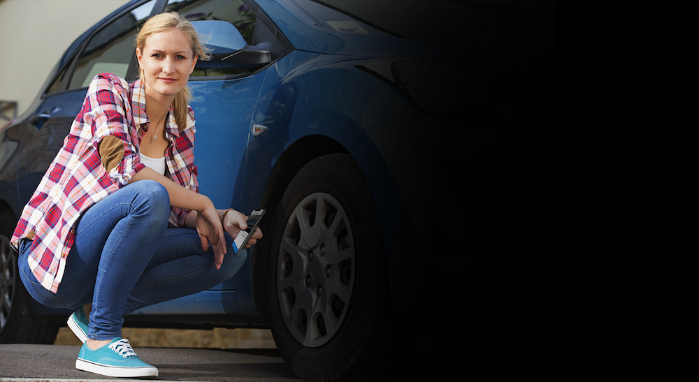 woman scanning a tire on a tire ecommerce