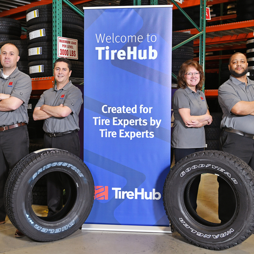 A tire processing and documentation scene featuring the mobile DOT Scanner, used by the company Tirehub.