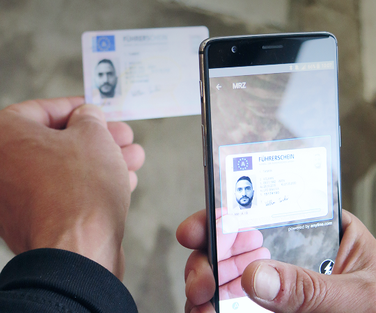 A smartphone scanning a driver´s license