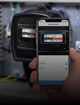 A smartphone scanning a meter