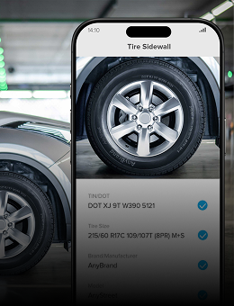A smartphone showing a tire sidewall scanner interface