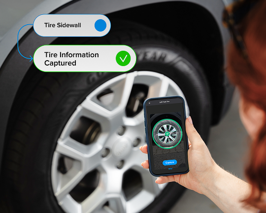 Smartphone displaying the Anyline tire scanner in action