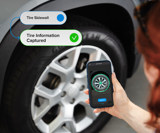 Smartphone displaying the Anyline tire scanner in action