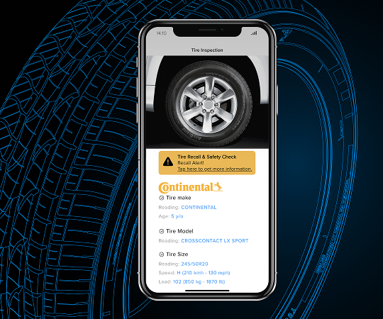 A smartphone showing a tire information scanner interface